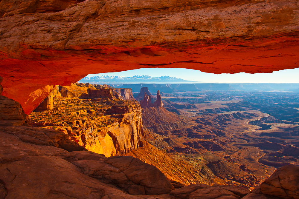 Mesa Arch (also known as Rotary Arch and Trail Arch) is a pothole arch on the eastern edge of the Island in the Sky mesa in Canyonlands National Park in northern San Juan County, Utah, United States.

The Hike to get here is not particularly long or difficult, and you can not tell from the photo, but there was about a foot of snow on the trail to get here.